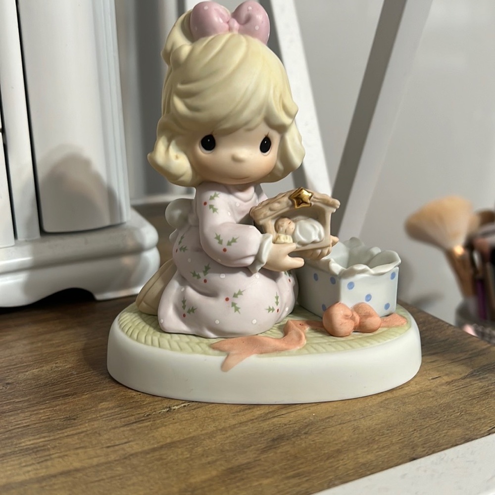 Precious moments celebrate his arrival figurine